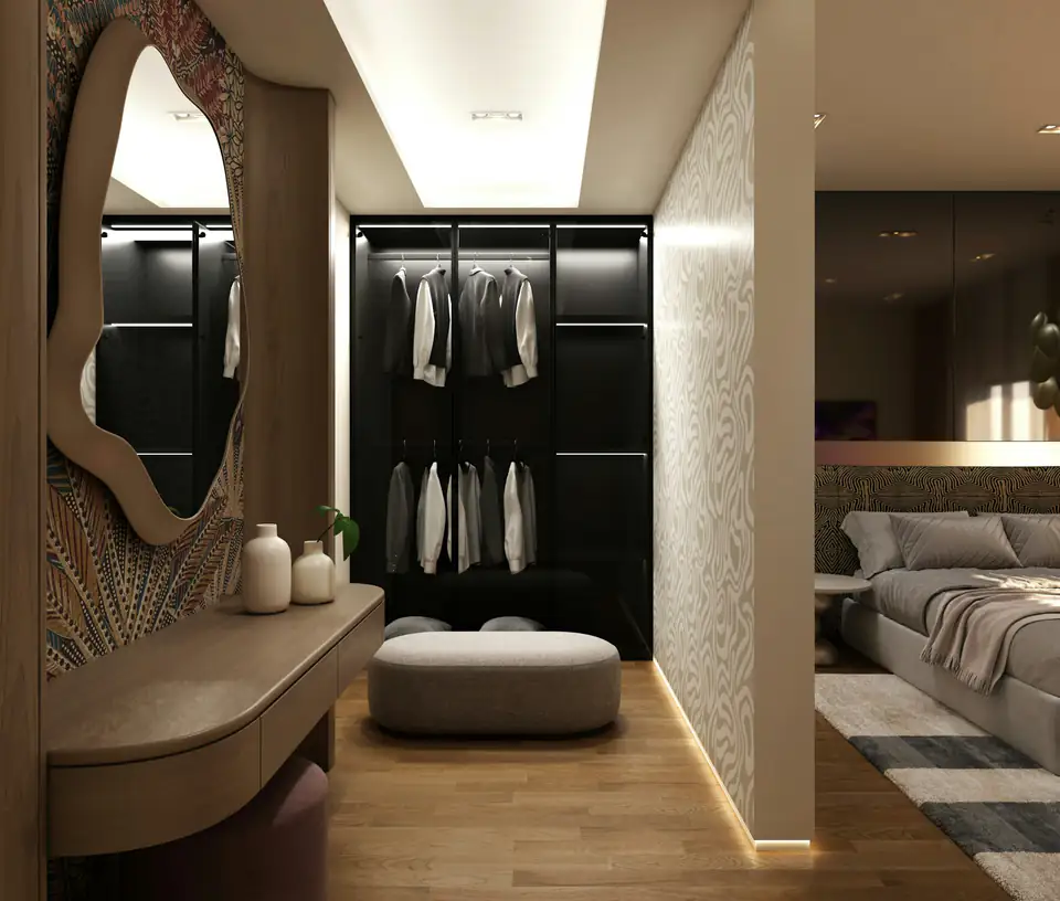 Dressing area with black wardrobe | Fitted wardrobes Newcastle Dressing area with a black wardrobe, sculpted mirror and vanity unit, design inspiration for bedrooms in Newcastle